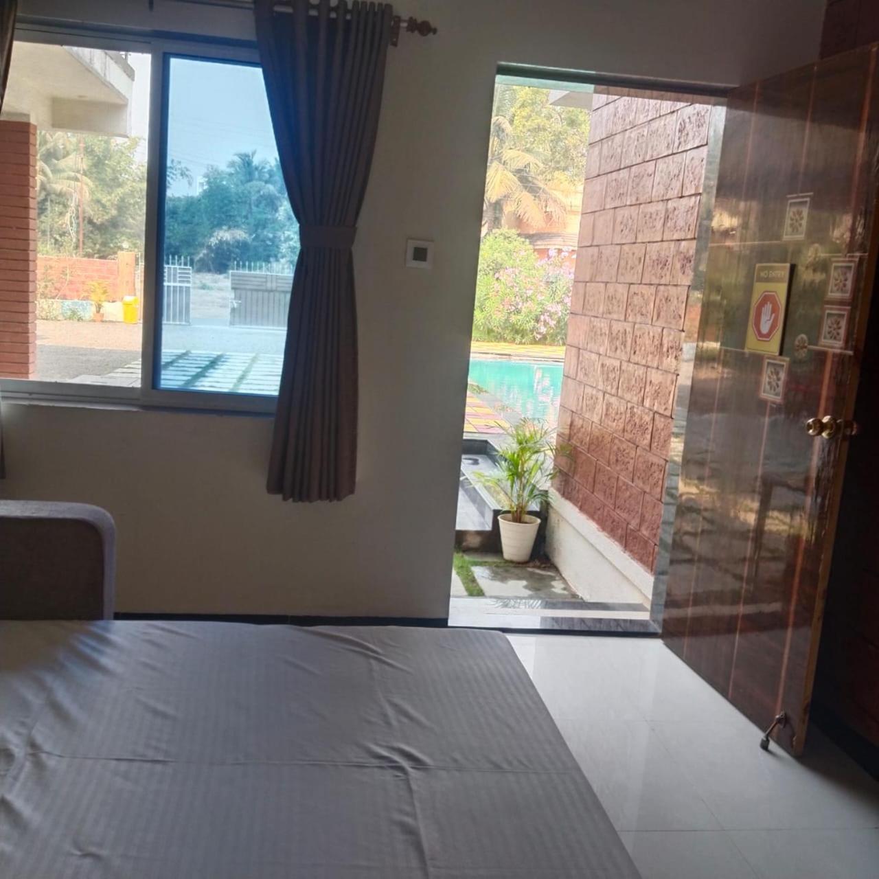 Scarlet Resort อลีบาก ภายนอก รูปภาพ